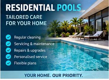 Residential pools — modern home with loungers beside a clear blue swimming pool