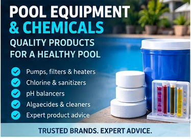 Pool equipment and chemicals — pool treatment products and testing equipment beside a pool